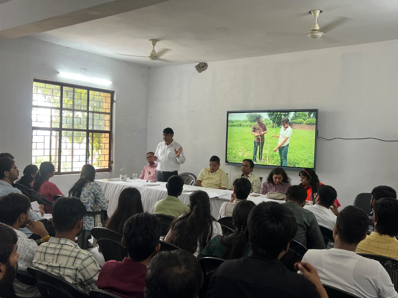 Instructor addressing students during a classroom training session